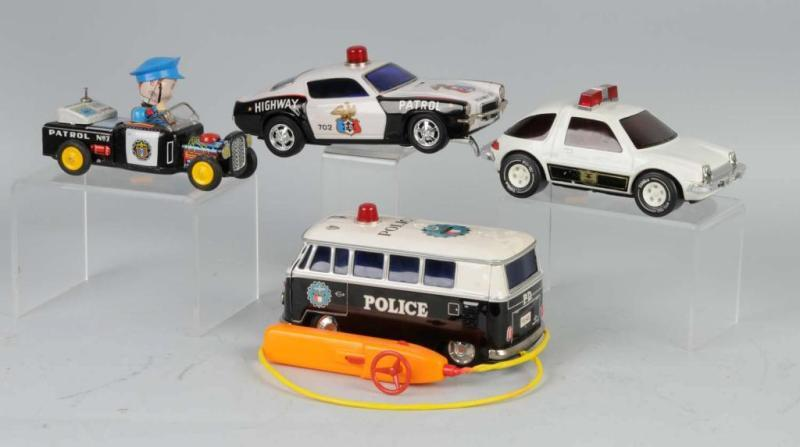 Lot of 4 Tin Pressed Steel Police Car Toys Description