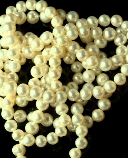 Strand of White Cultured Pearls of opera length the pearls