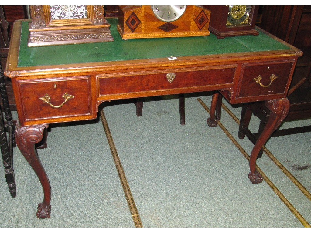 Writing desk on carved cabriole legs and ball and claw