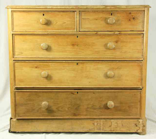 A pine chest of three long and two short drawers