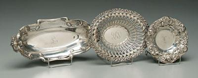 Three sterling bowls one oval with high relief iris decoration