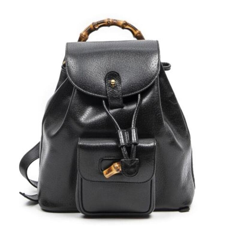 Gucci drawstring backpack in black grained leather with gold tone