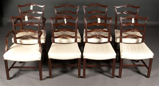Set of eight Chippendale style carved mahogany ribbon back dining