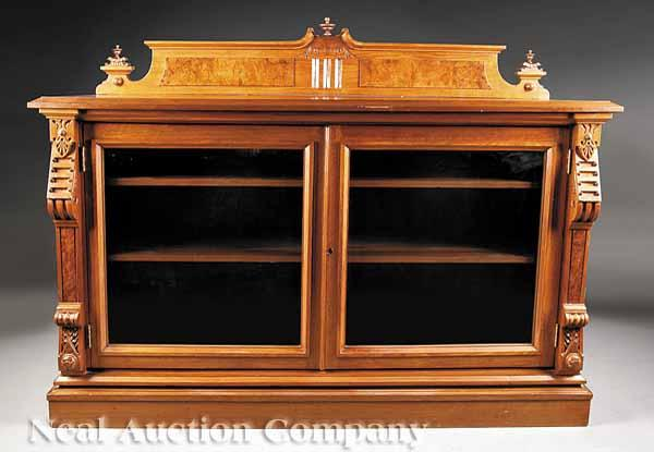 An American Renaissance Carved Walnut and Burled Collector s Cabinet