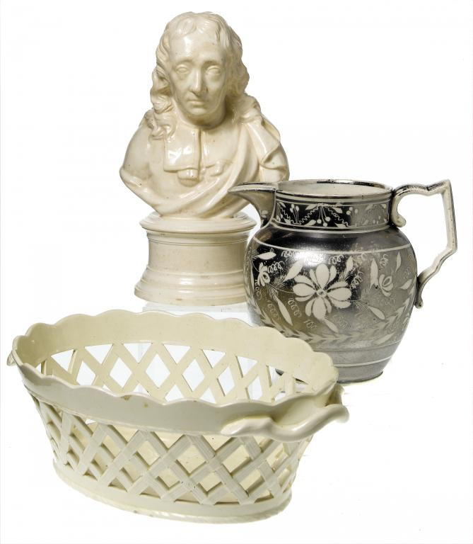 A PEARLWARE JUG with silver resist decoration of flowers and
