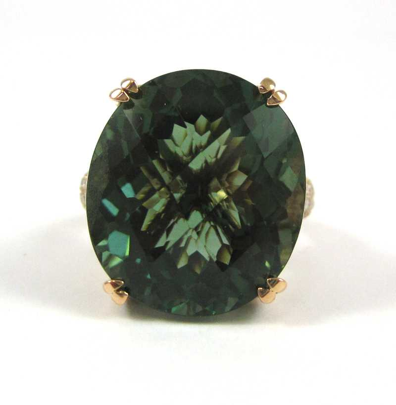 GREENED AMETHYST AND FOURTEEN KARAT GOLD RING The rose gold