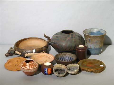 ECLECTIC GROUP OF POTTERY AND MINERALS Comprising a black Native