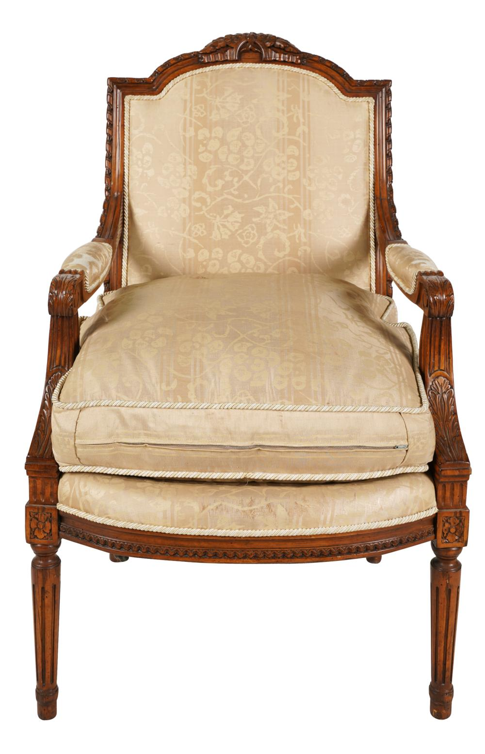 LOUIS XVI STYLE CARVED WALNUT FAUTEUILcovered with beige silk 24