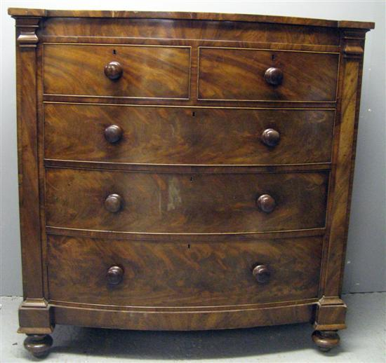 Scottish mahogany break bow fronted chest of two short over
