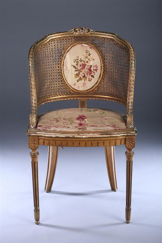LOUIS XVI CARVED AND GILT WOOD CANED BARREL BACK HALF