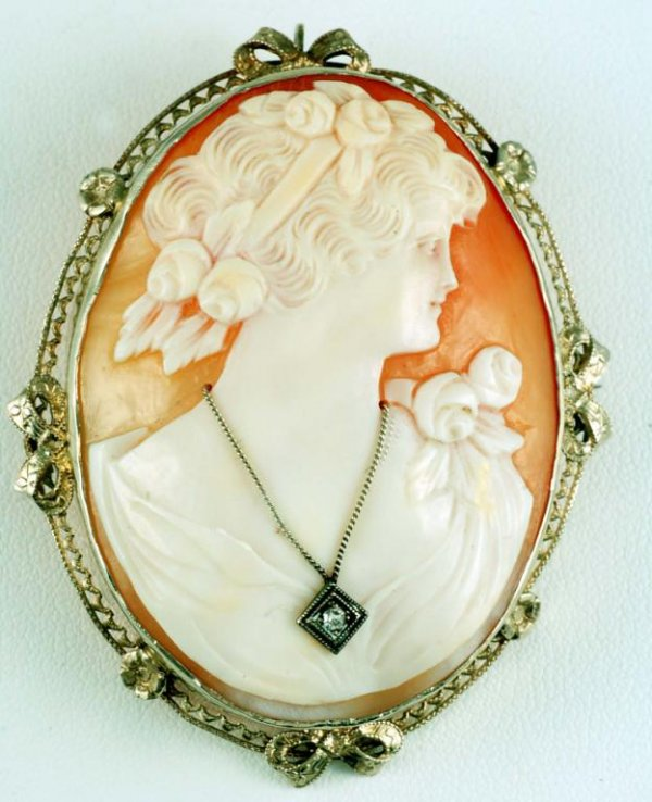 Large and fine carved shell cameo brooch of lady with