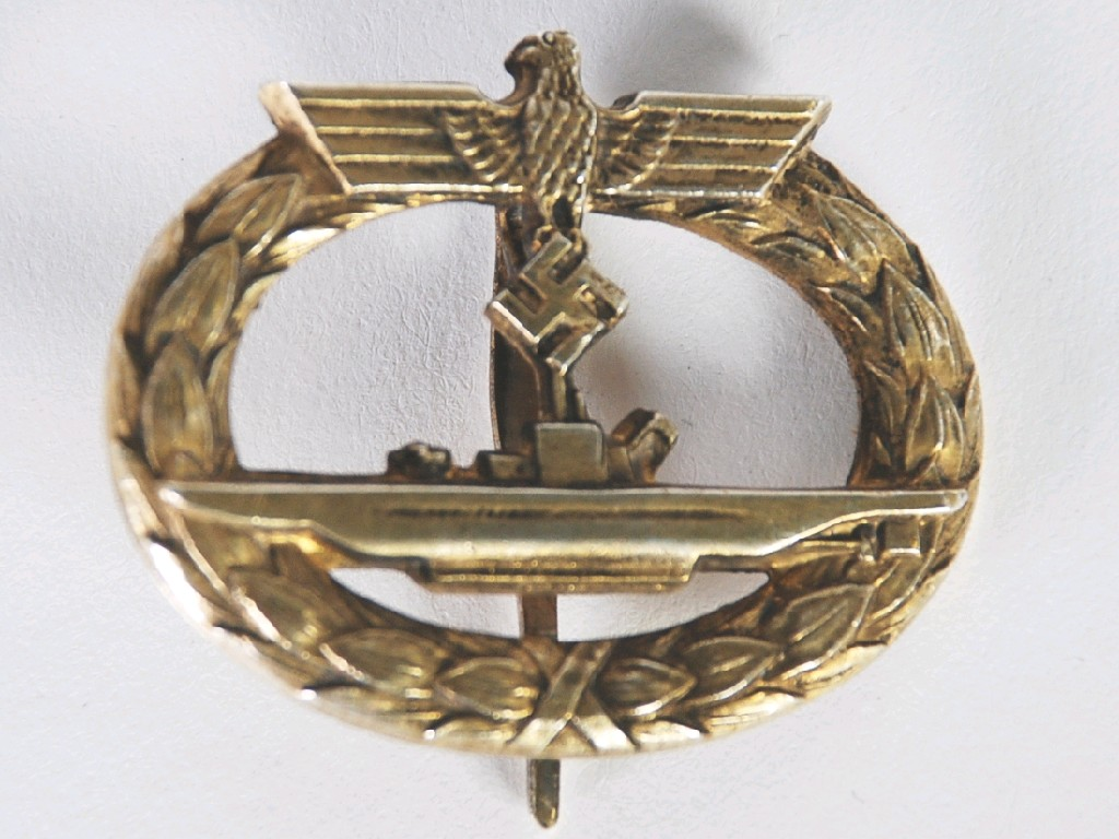 MID WAR ALLOY U BOAT BADGE in gilt the reverse