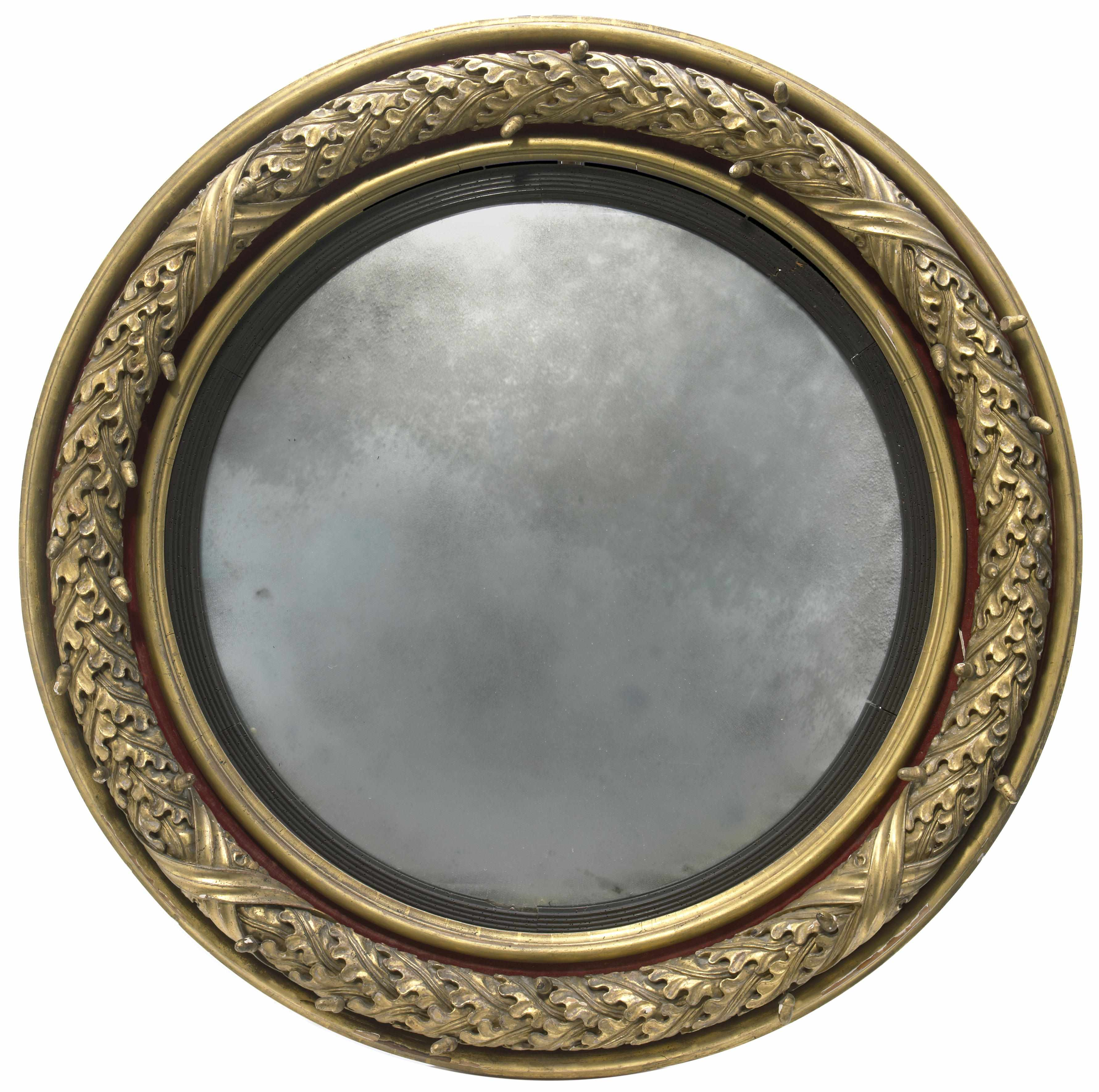 A Regency giltwood and gesso convex mirror first quarter 19th