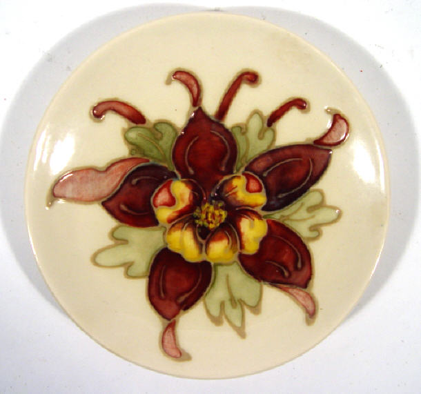 Moorcroft pottery pin dish hand painted and tubelined with an