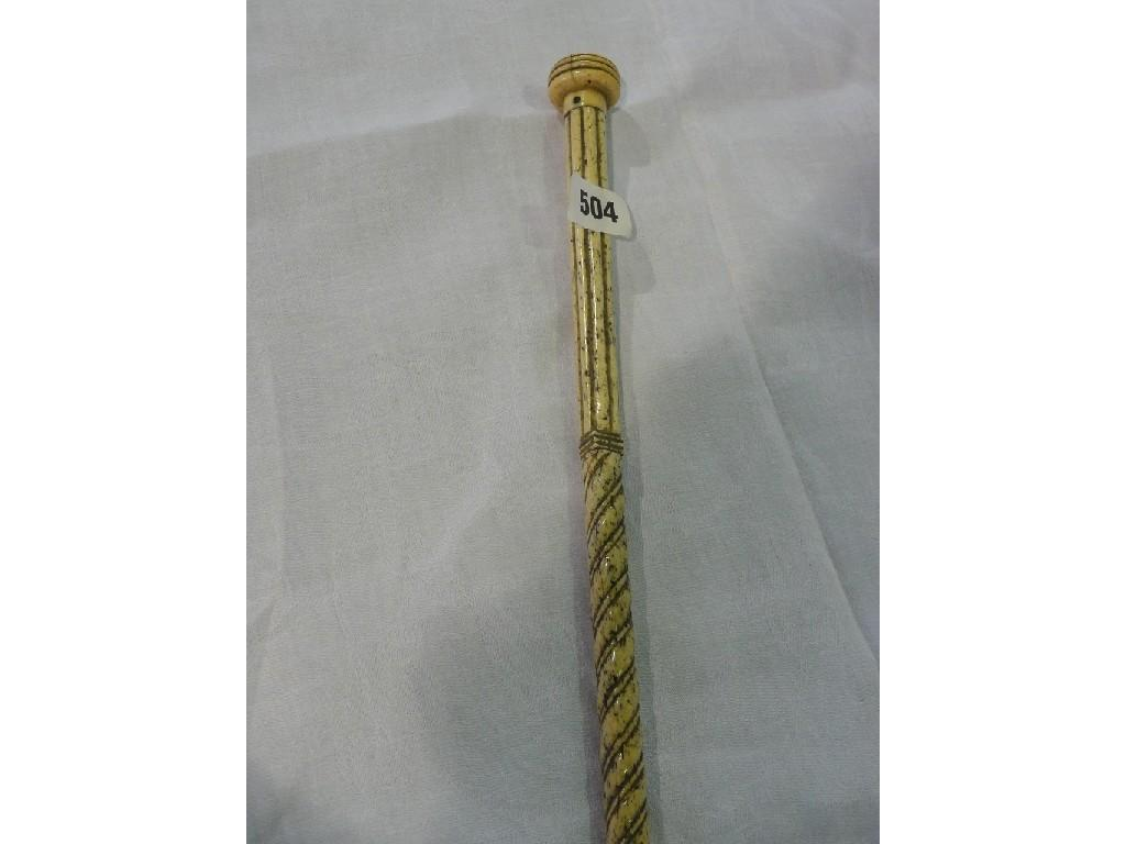 An bone walking cane with reeded top section a spiral