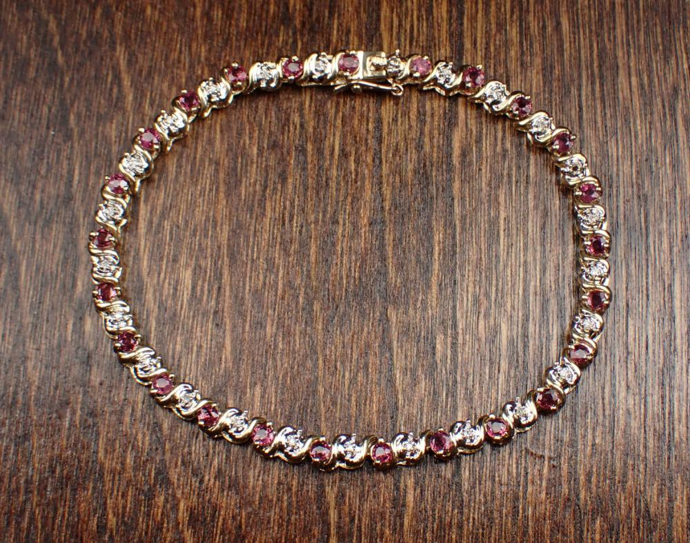 RUBY DIAMOND AND TWO TONE GOLD BRACELET The 7 1