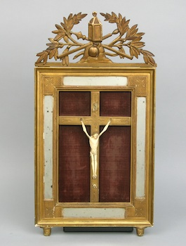 A Continental Carved Bone Crucifix in a Decorative Frame An