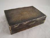 A silver cigarette box with engine turned finish 13x9x3cm