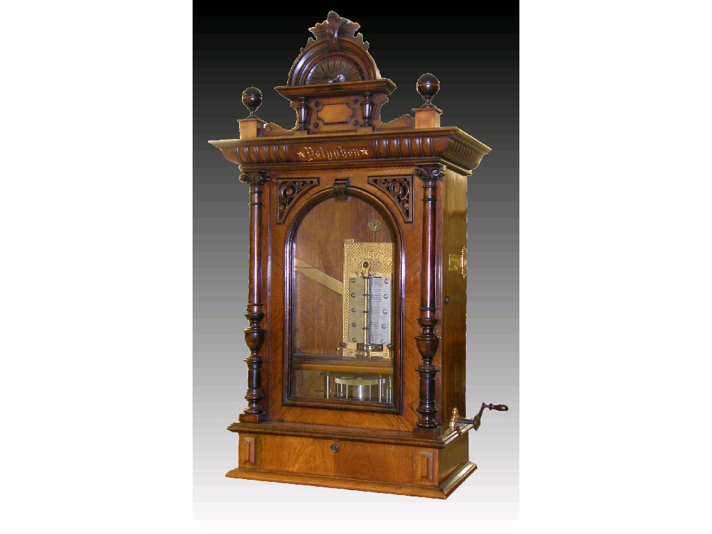German walnut penny in the slot polyphon within an arched