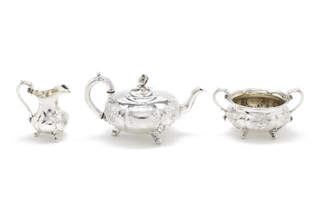 A George IV silver three piece tea service by Paul