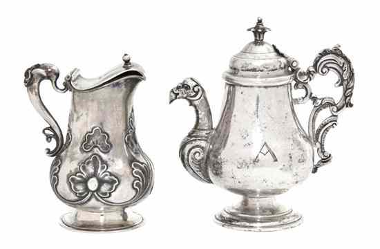Two Continental Silver Creamers possibly Spanish Colonial each of lidded