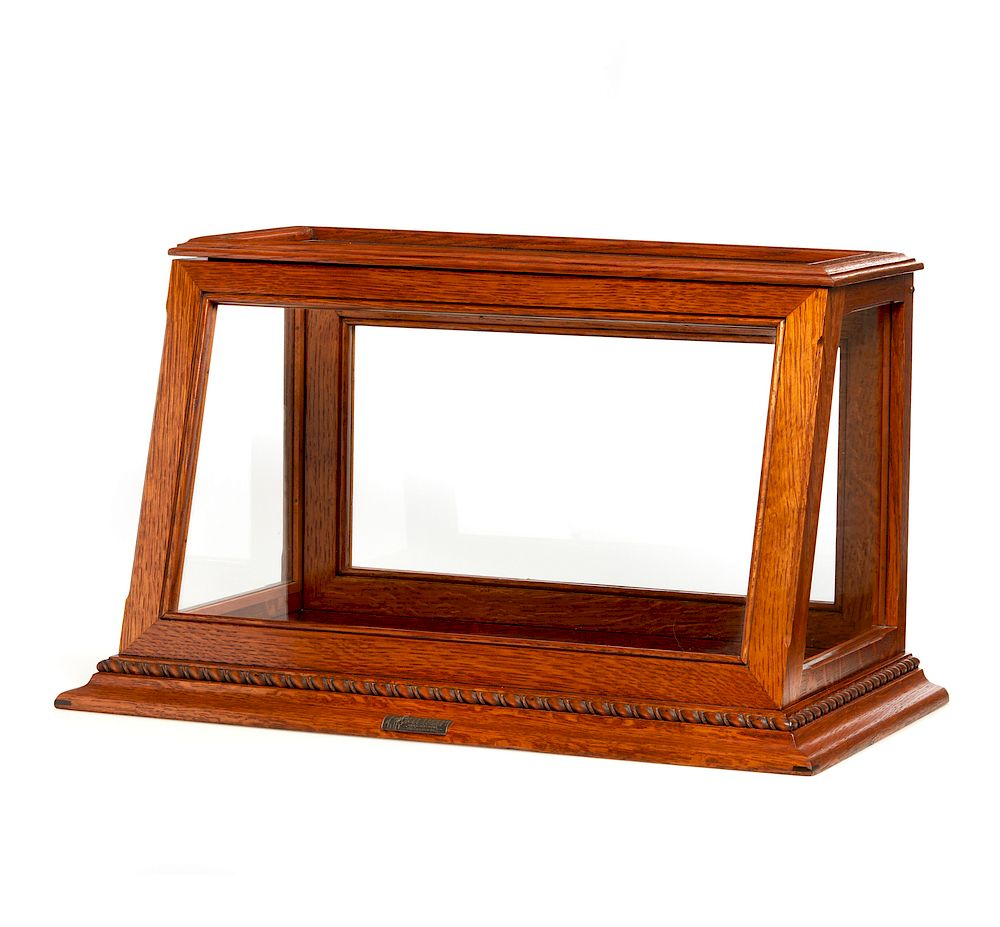 Winchester Display Case Wood and glass display case in the
