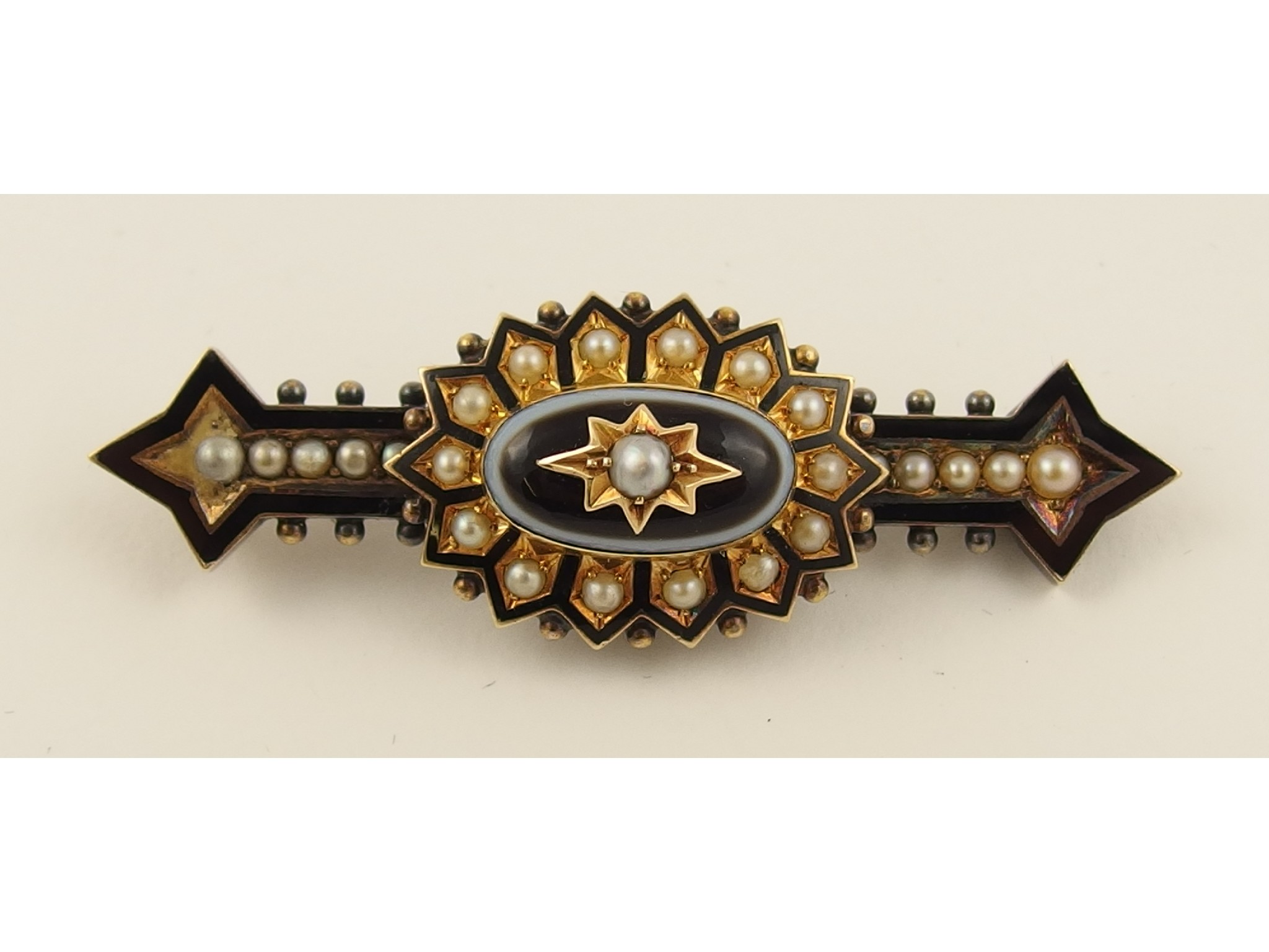 A yellow metal Mourning brooch set with a banded agate