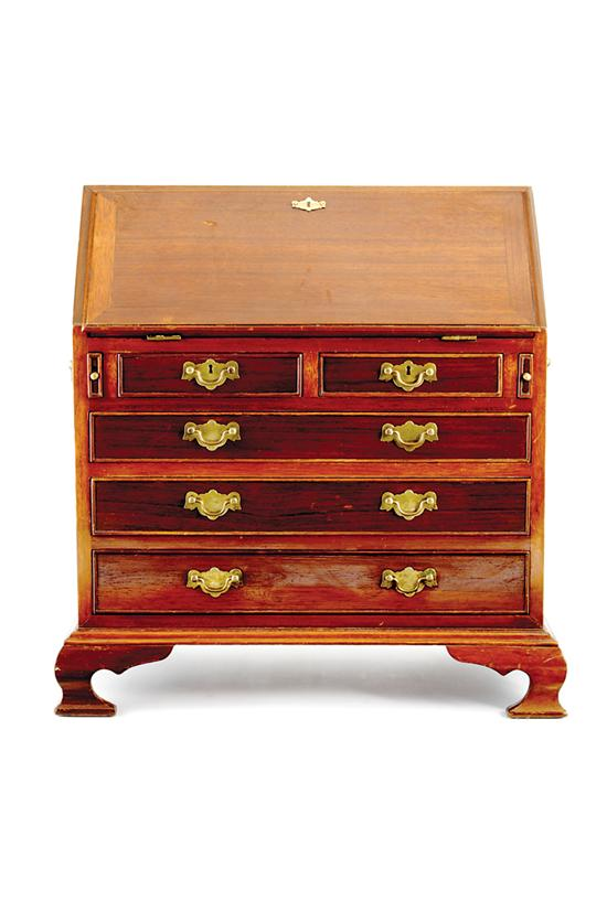 Miniature George III style mahogany bureau slant front opening to