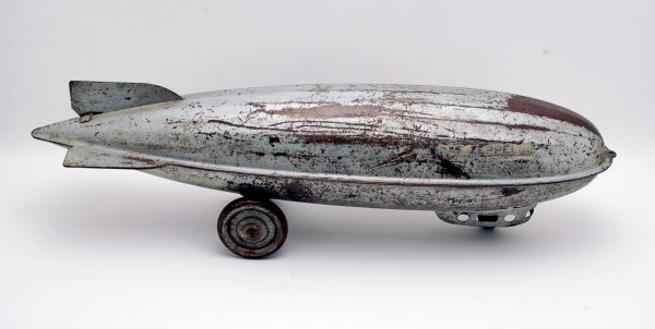 Graf Zeppelin pull toy silver painted tin side decals Graf