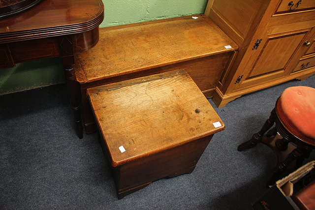 AN OAK AND ELM BLANKET CHEST of plain form with