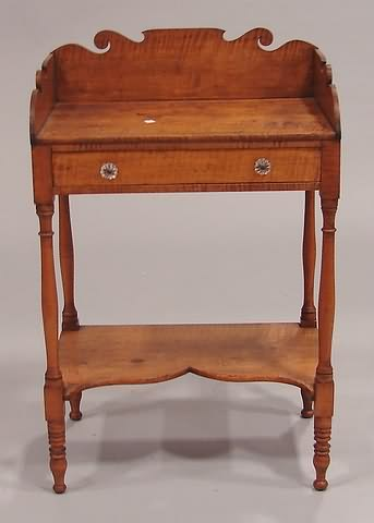 Shaped backsplash single drawer turned legs with shaped stretcher 37