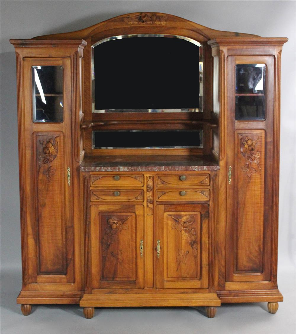 ART NOUVEAU CARVED WALNUT CABINET BUFFET having an arched and