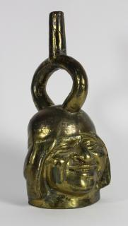 Pre Columbian style brass stirrup vessel with circular split standard