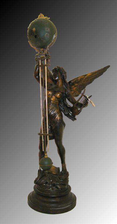 French patinated spelter mystery timepiece modelled as an angel holding