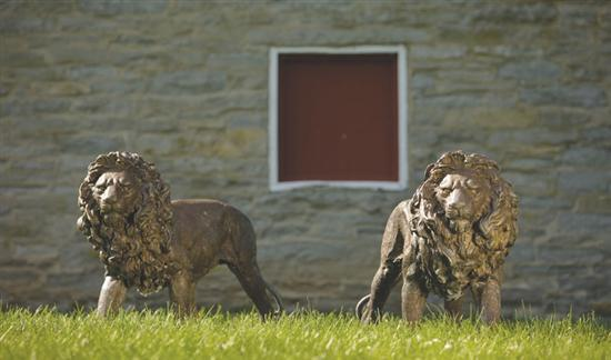 PAIR OF BRONZE LIONS American late 19th early 20th century