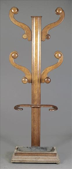 A Victorian oak hall stand circa 1870 with four scrolling