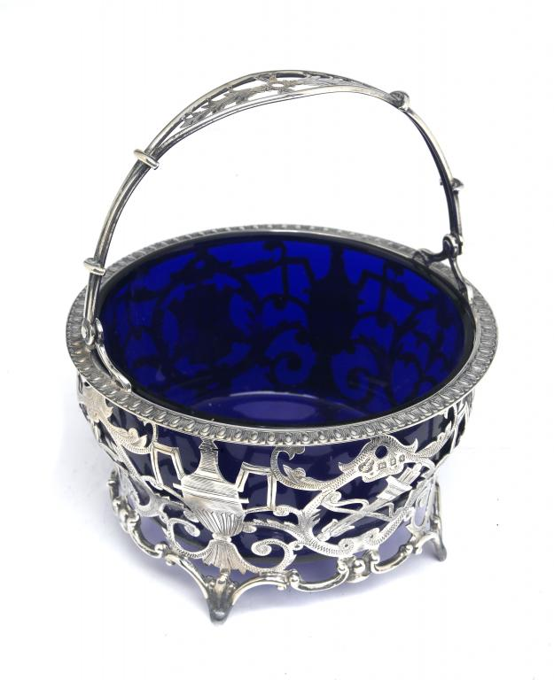 AN EDWARD VII PIERCED AND ENGRAVED SUGAR BASKET with neo