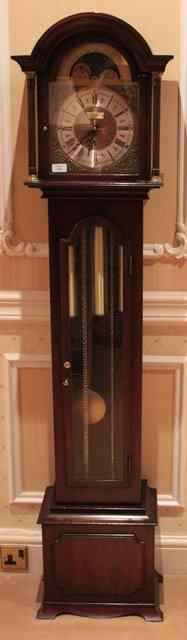 A SMALL SIZE MODERN MAHOGANY LONG CASE CLOCK the arching