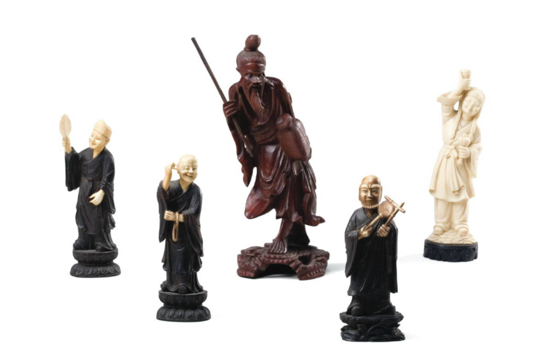 GROUP OF CHINESE CARVED WOOD AND BONE FIGURES OF BUDDHIST