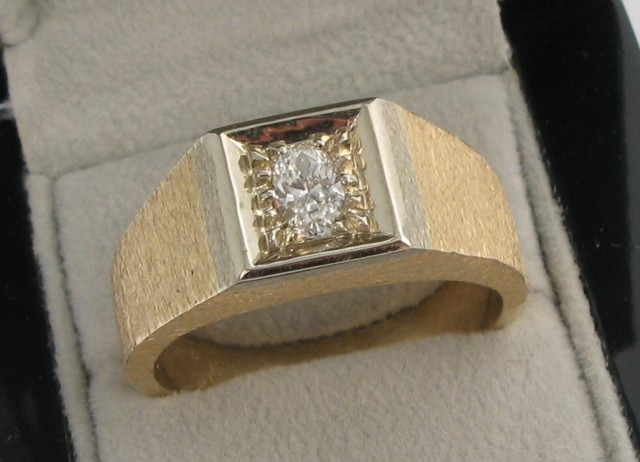 GENT S DIAMOND AND FOURTEEN KARAT GOLD SOLITAIRE RING featuring