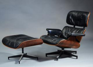 Herman Miller black leather and rosewood chair and ottoman Herman