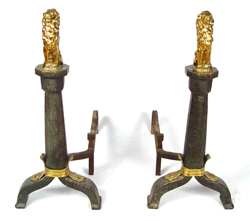 WROUGHT IRON AND BRASS LION ANDIRONS FIREDOGS Each surmounted by