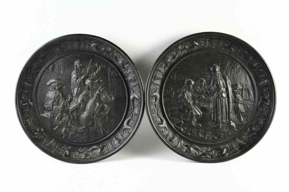 WALL CHARGERS Pair of 19th c cast iron repousse wall