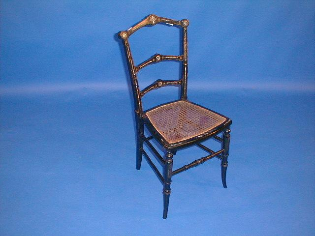 A Victorian papier mach and mother of pearl bedroom chair