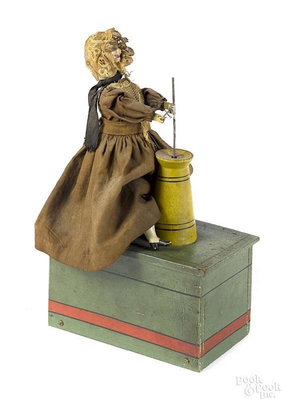 Ives clockwork butter churner Ives clockwork butter churner on a
