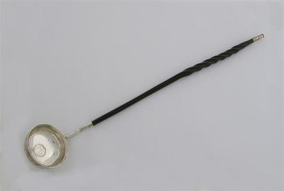 A George III punch ladle with a twisted whalebone handle