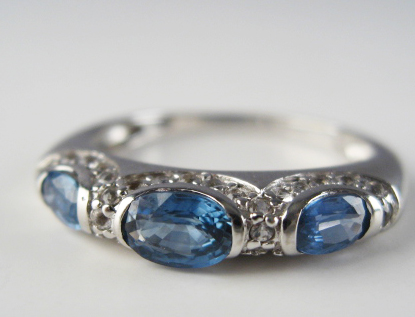 A Gold and Sapphire Ring 14K marked white gold set