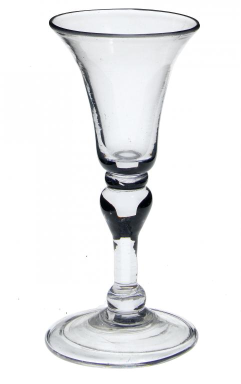 A WINE GLASS the bell bowl on inverted baluster solid