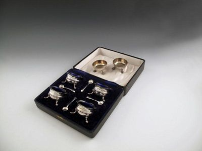 A pair of Victorian silver salt cellars by George Adams