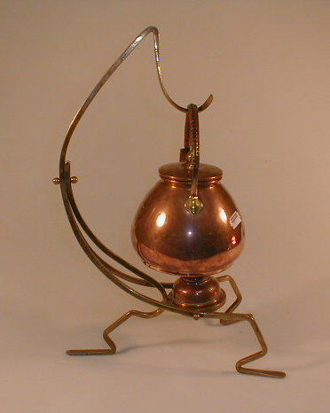 A German Arts Crafts copper and brass spirit kettle on
